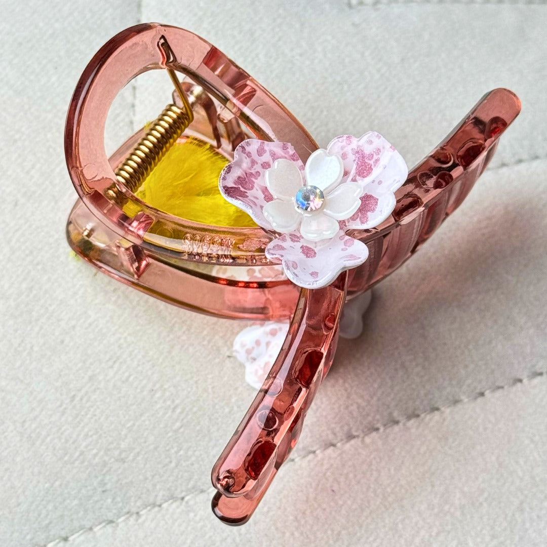 Glossy finish hair claw for a sleek, elegant hair accessory option.