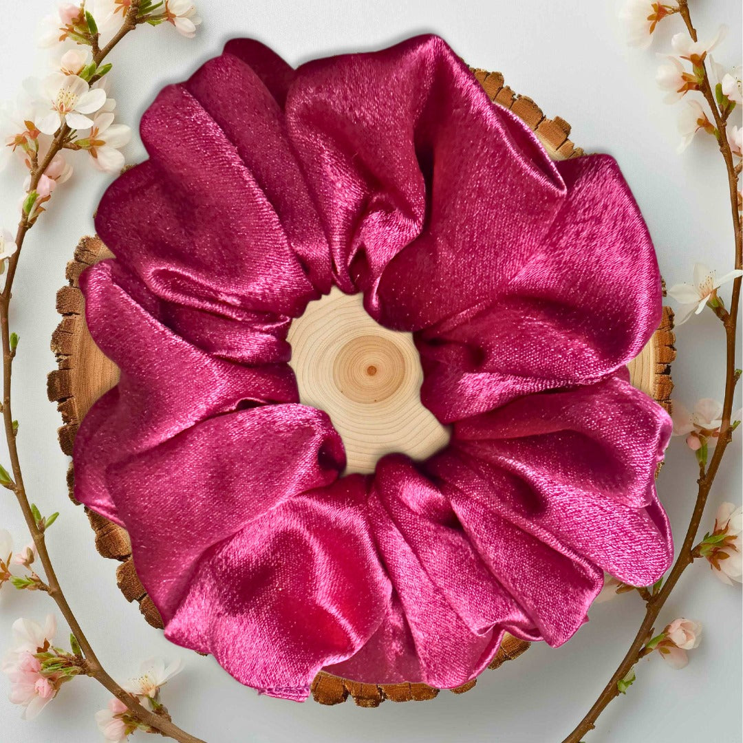 Luxurious champagne silk scrunchie ideal for gentle hair styling.